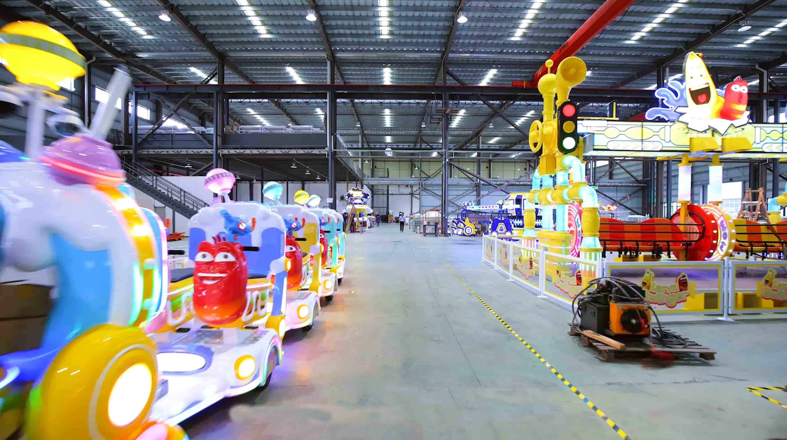 Illustrative amusement ride assembly workshop